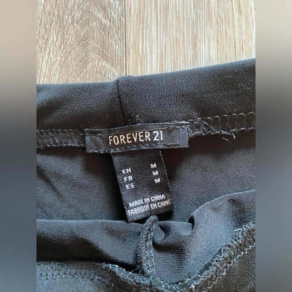 Never worn black pants. Stretchy. Flare style size M - Picture 2 of 2